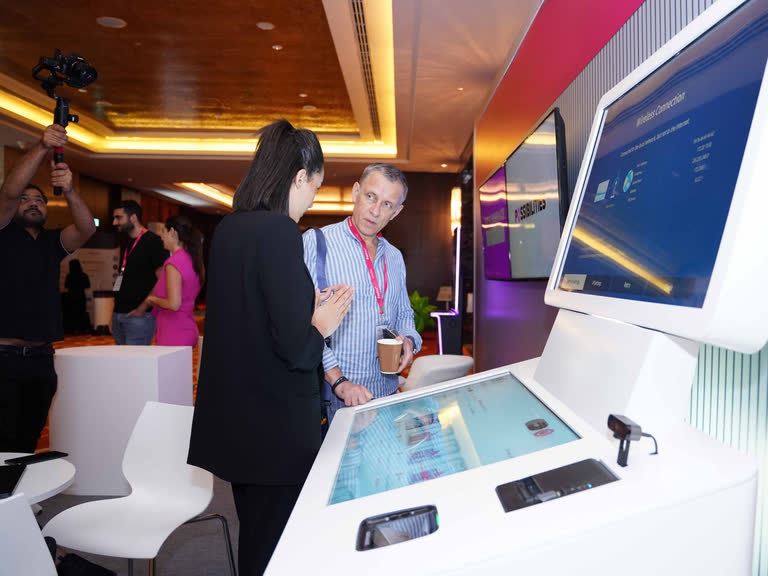 Visitors at an interactive exhibition display at a Vostad event